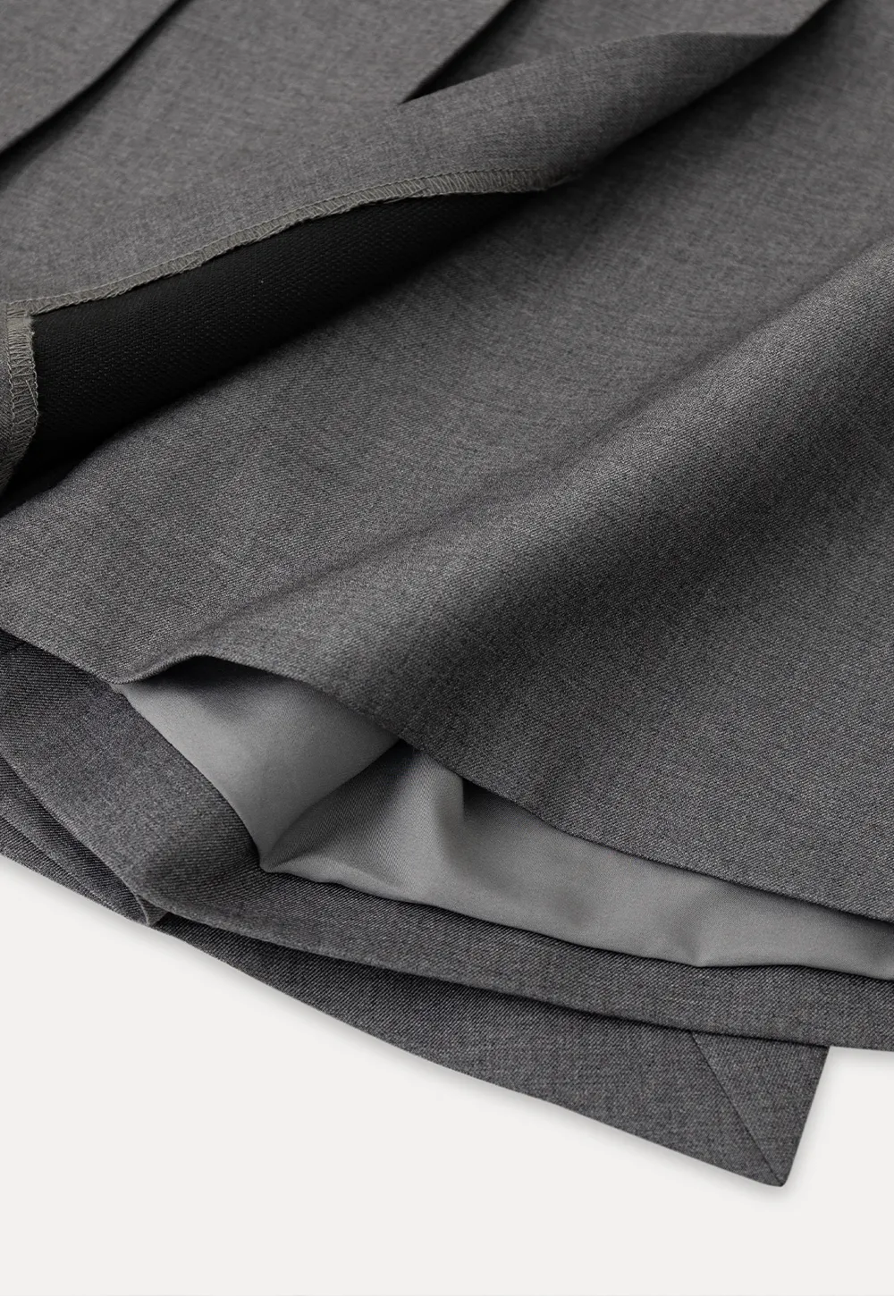 Pleated skirt with front button closure