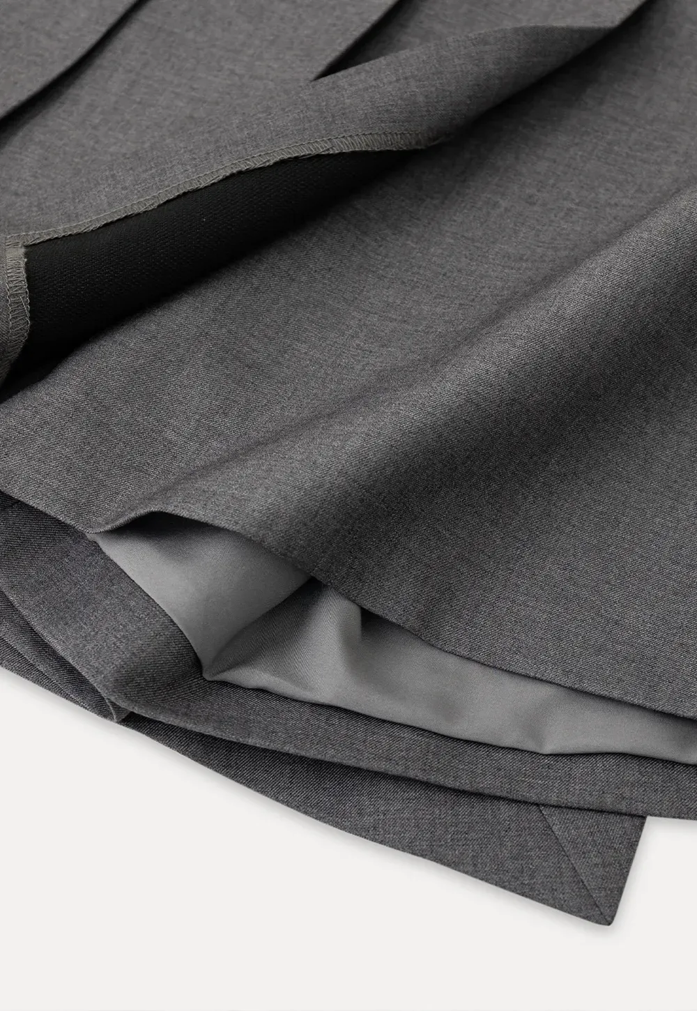 Pleated skirt with front button closure