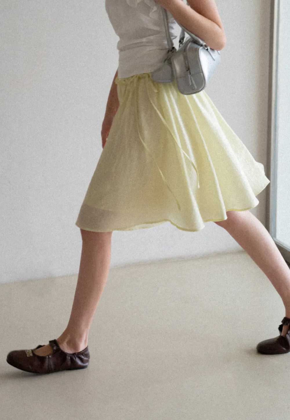 Flowy A-line skirt with gathered waist and layered hem