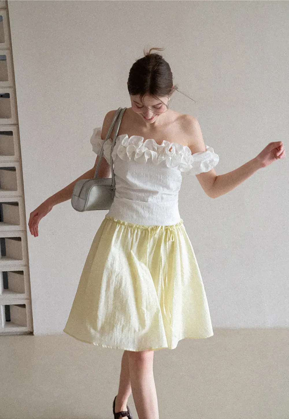 Flowy A-line skirt with gathered waist and layered hem