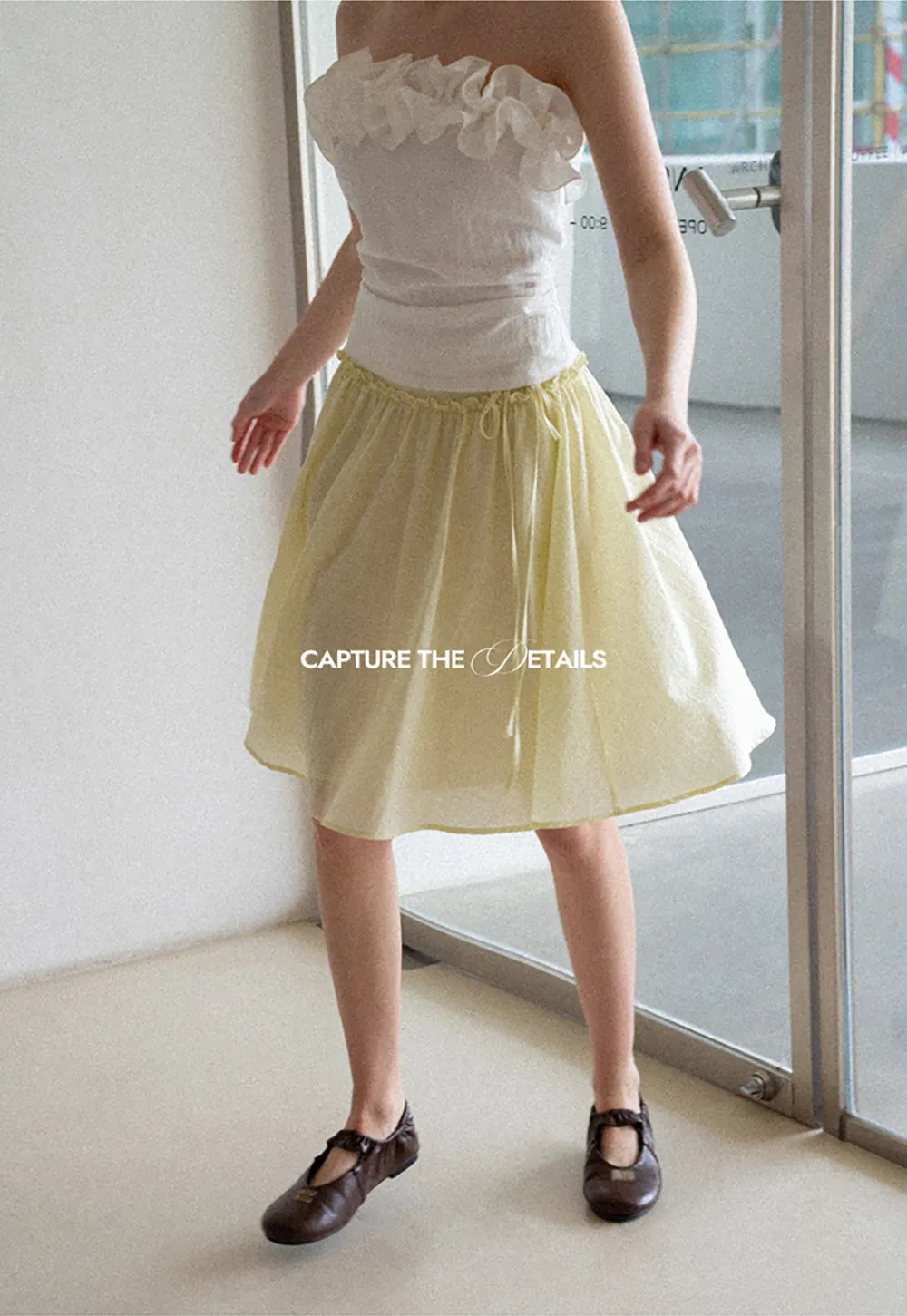 Flowy A-line skirt with gathered waist and layered hem