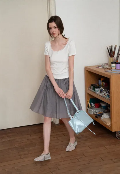 Flowy A-line skirt with gathered waist and layered hem