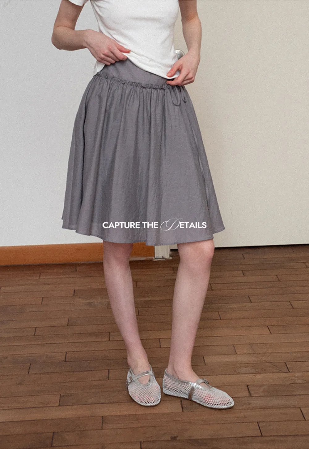 Flowy A-line skirt with gathered waist and layered hem