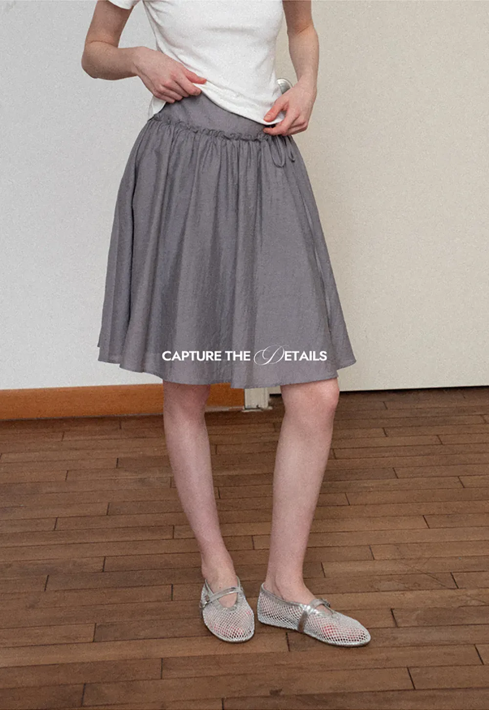 Flowy A-line skirt with gathered waist and layered hem