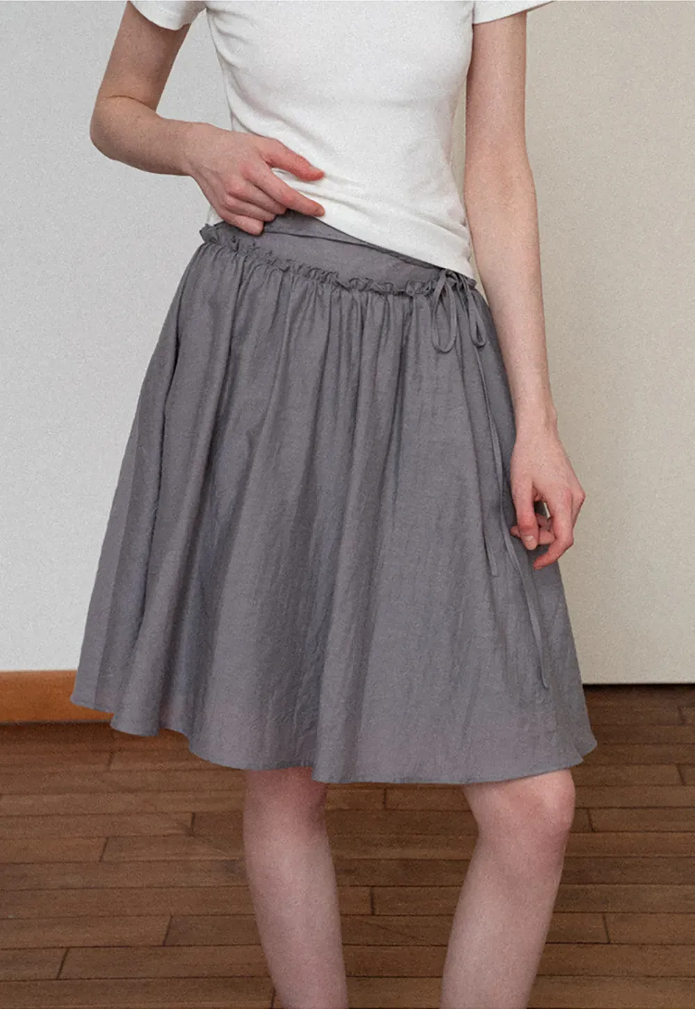 Flowy A-line skirt with gathered waist and layered hem