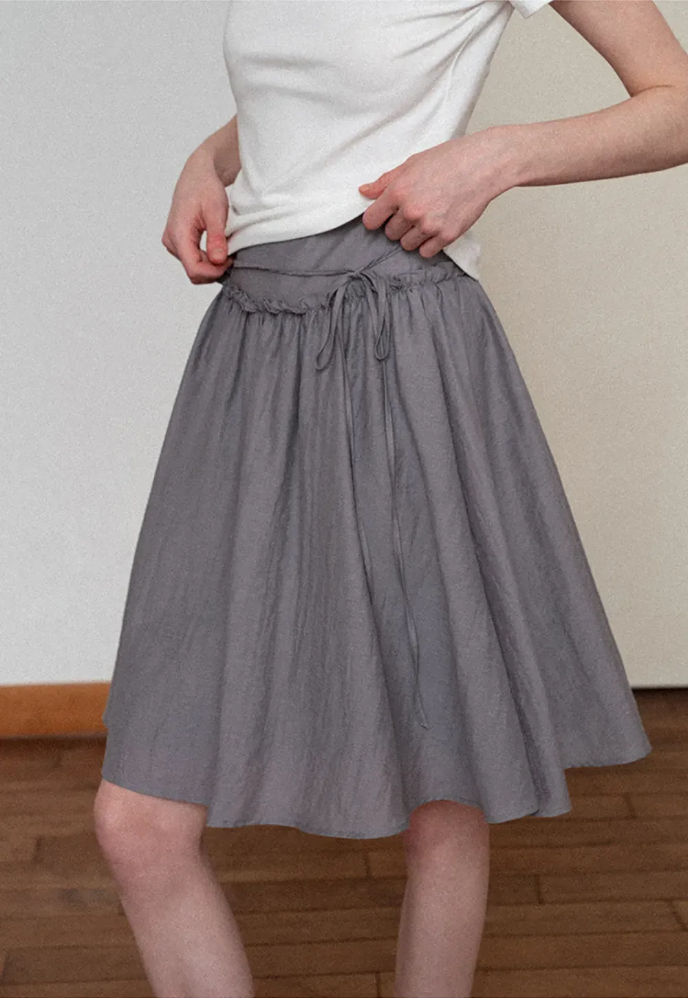 Flowy A-line skirt with gathered waist and layered hem