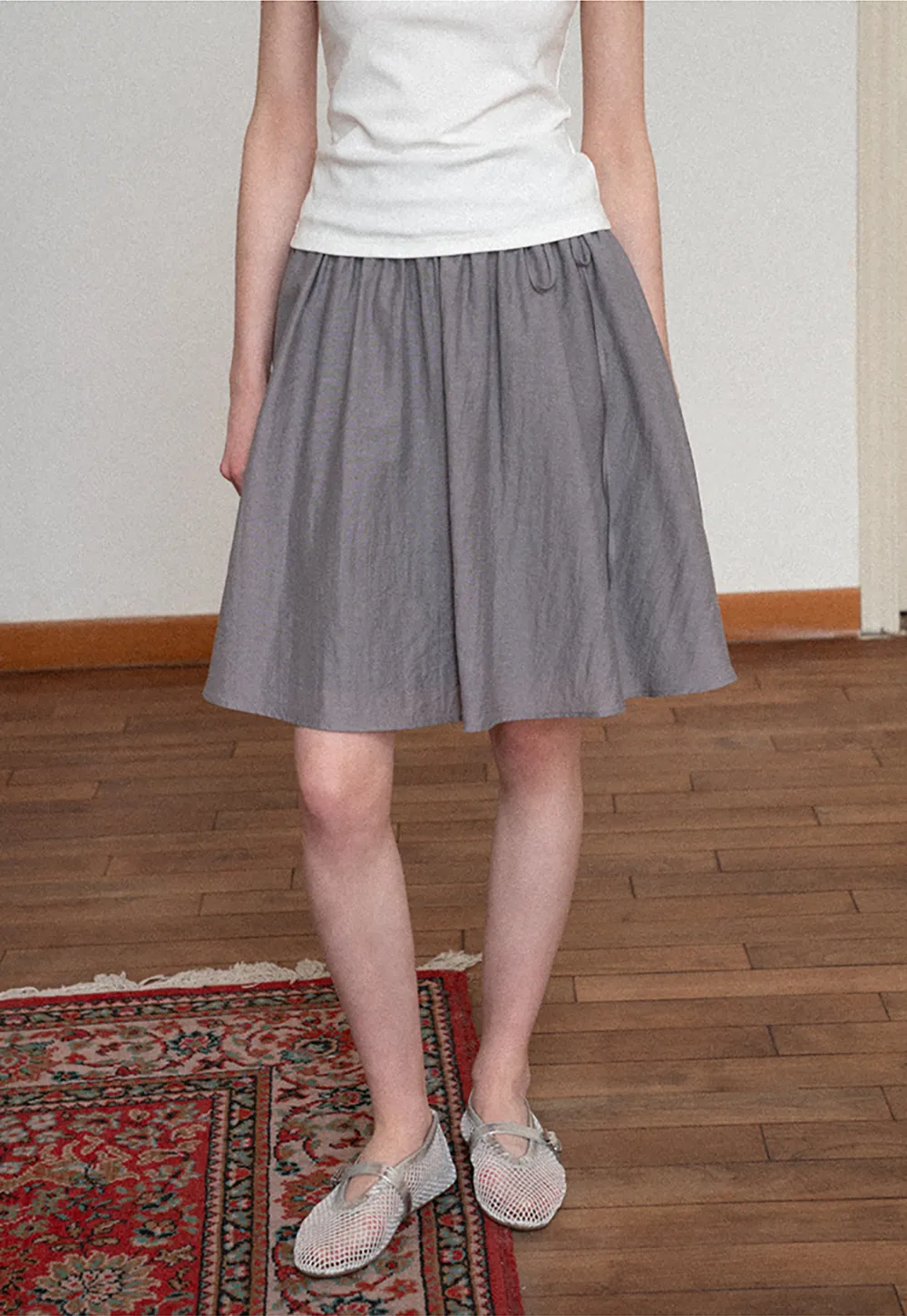 Flowy A-line skirt with gathered waist and layered hem