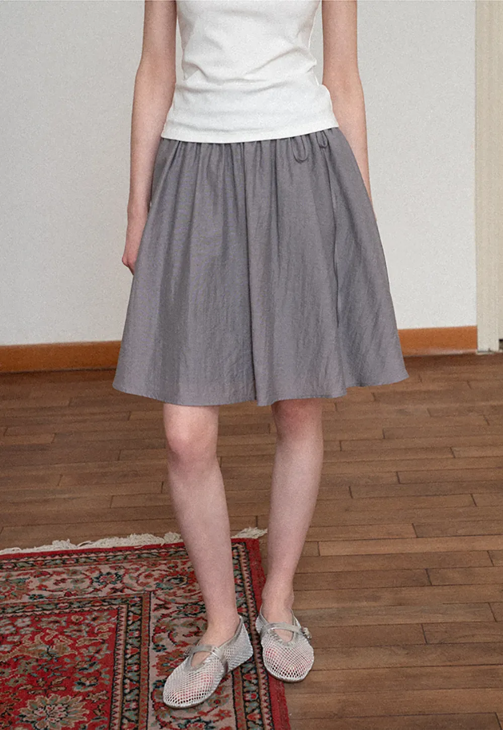 Flowy A-line skirt with gathered waist and layered hem