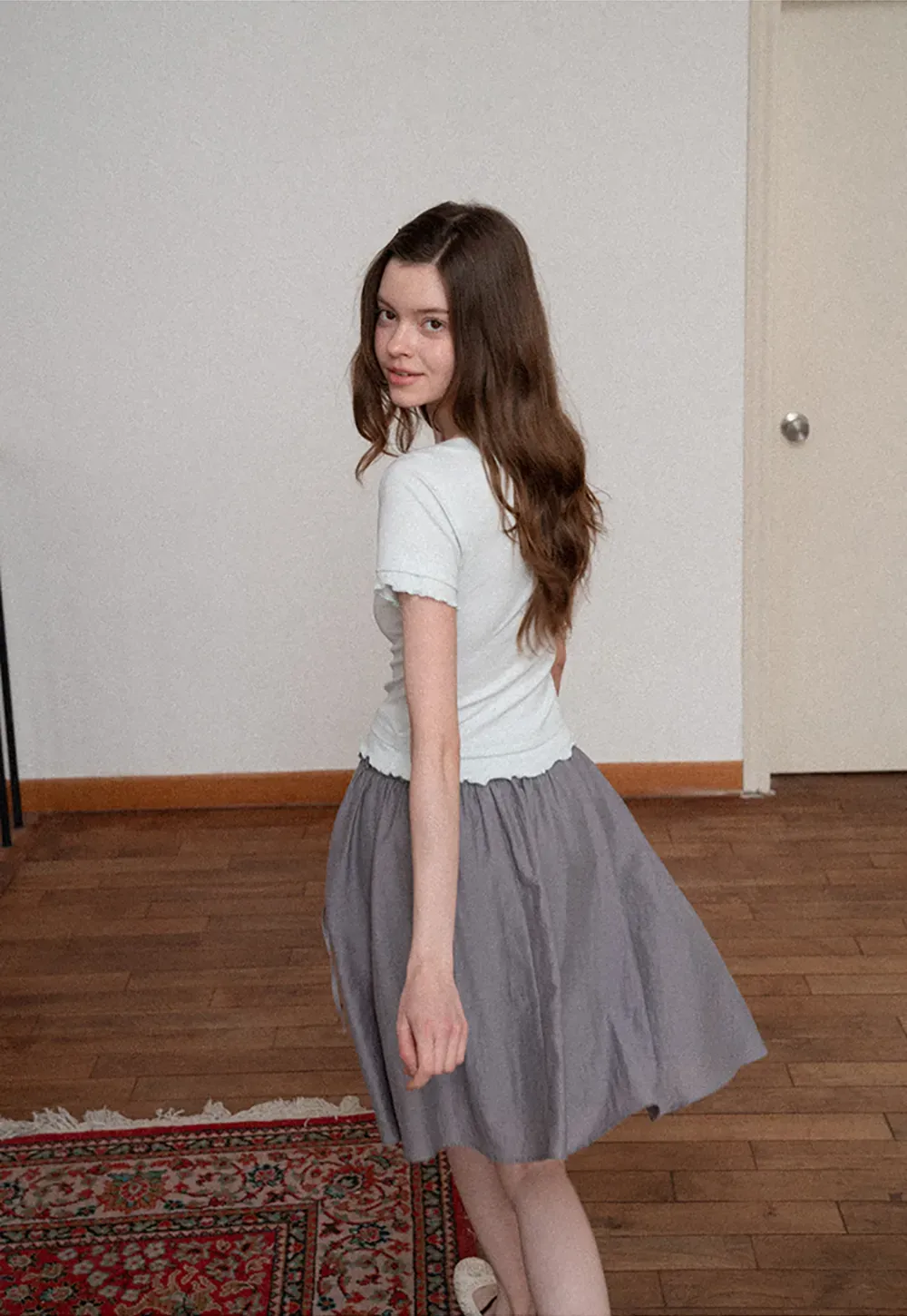 Flowy A-line skirt with gathered waist and layered hem