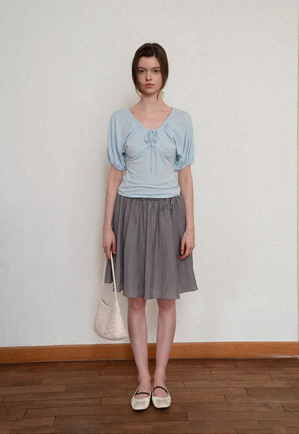 Flowy A-line skirt with gathered waist and layered hem