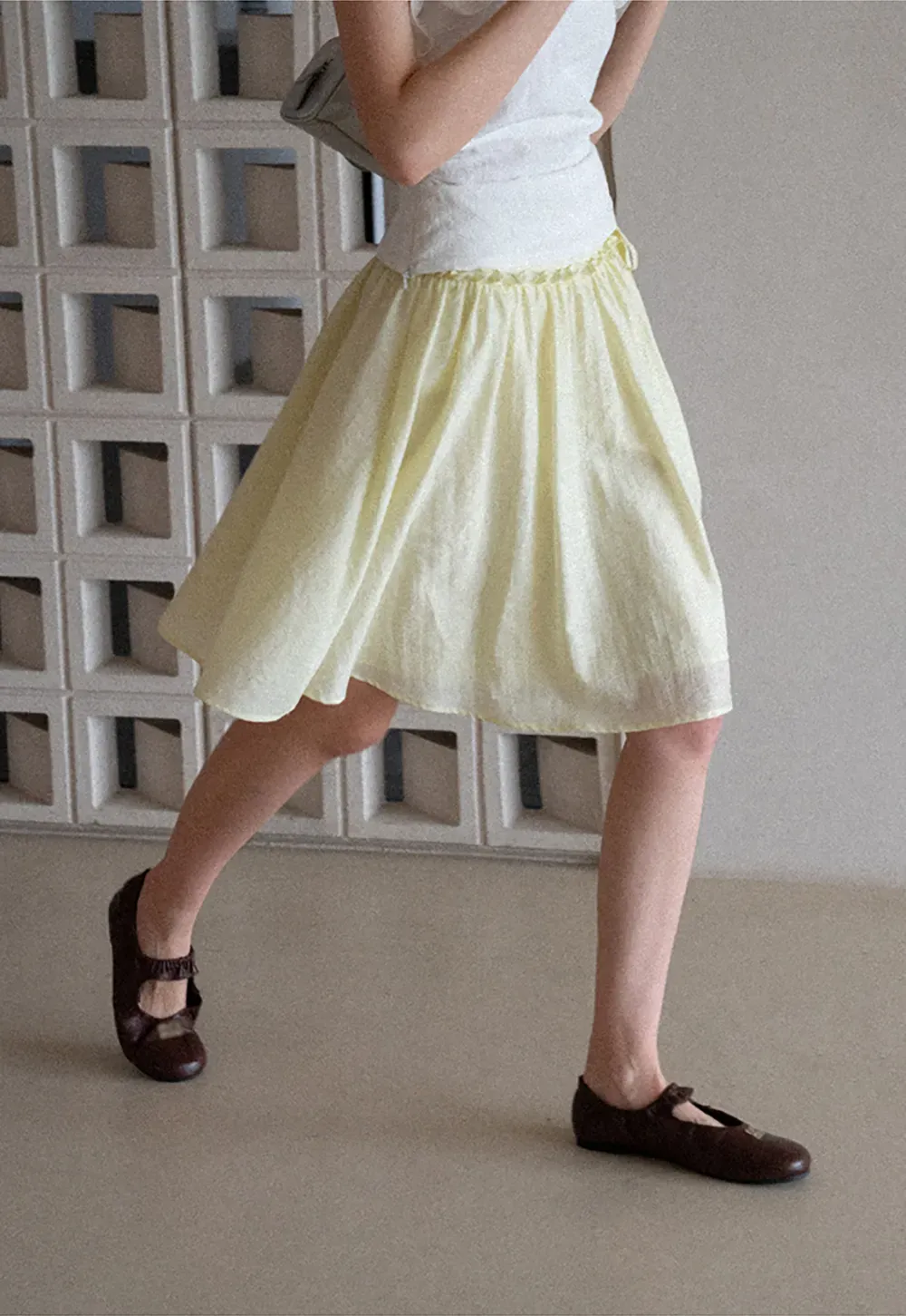 Flowy A-line skirt with gathered waist and layered hem