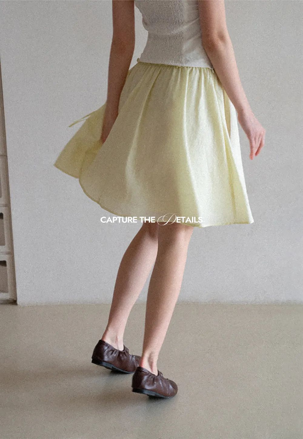Flowy A-line skirt with gathered waist and layered hem