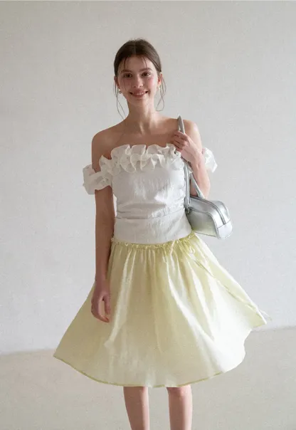 Flowy A-line skirt with gathered waist and layered hem