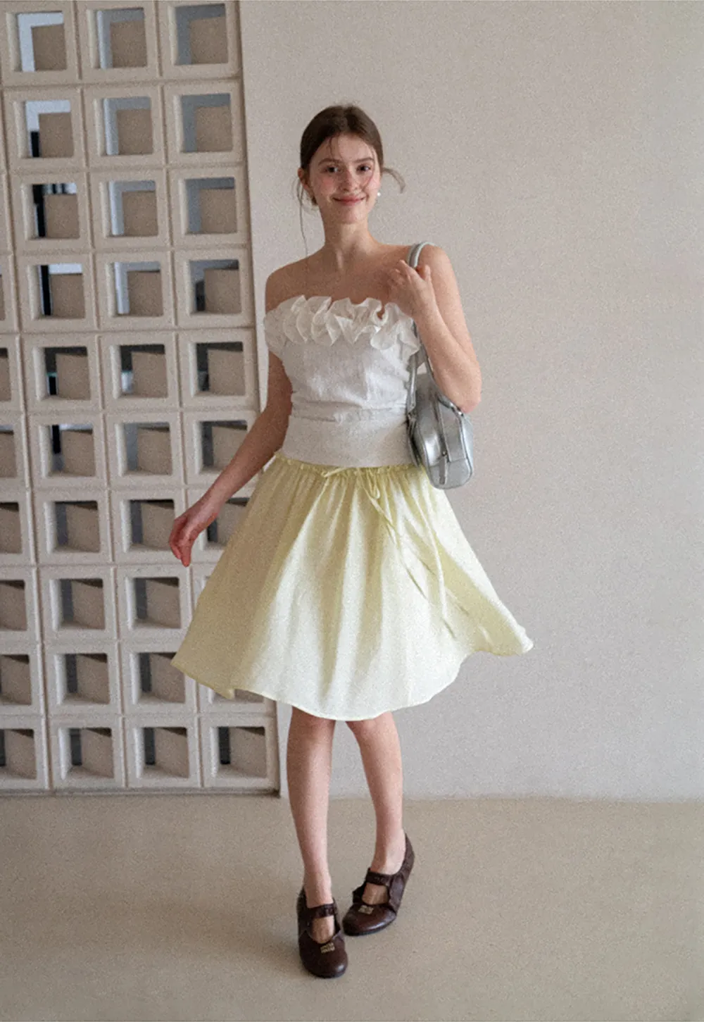 Flowy A-line skirt with gathered waist and layered hem