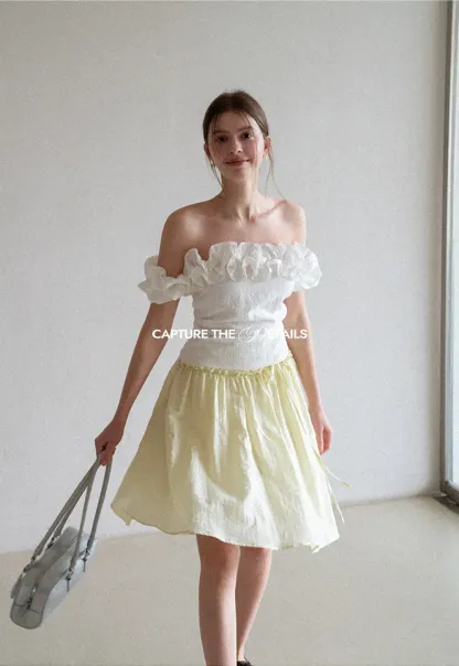 Flowy A-line skirt with gathered waist and layered hem