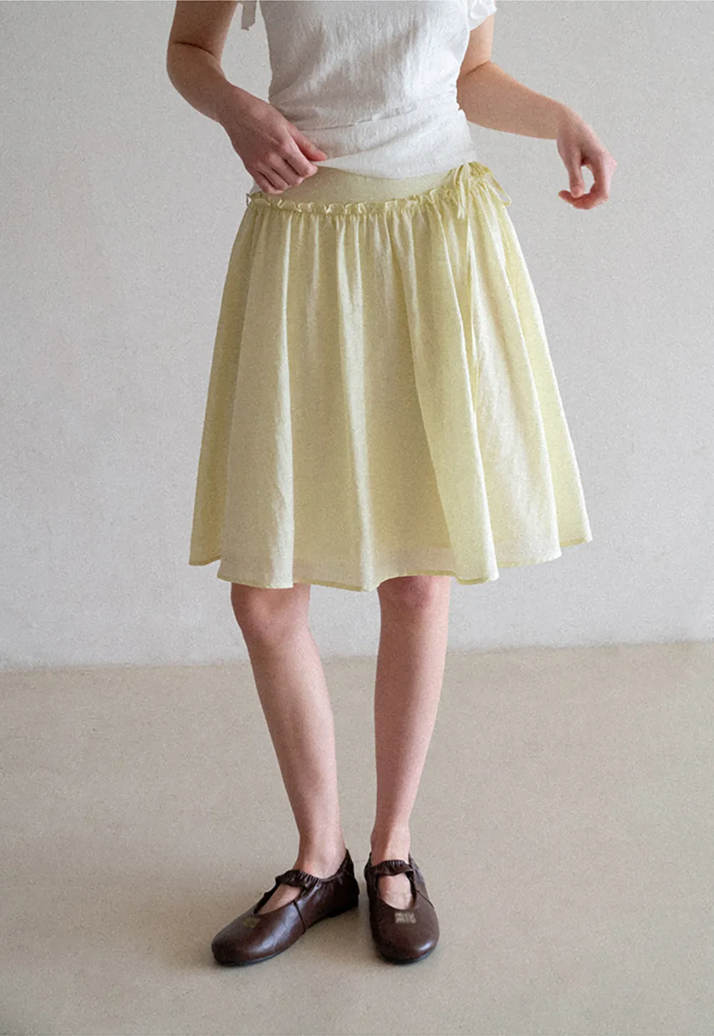 Flowy A-line skirt with gathered waist and layered hem