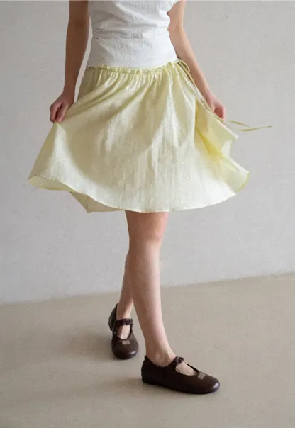 Flowy A-line skirt with gathered waist and layered hem