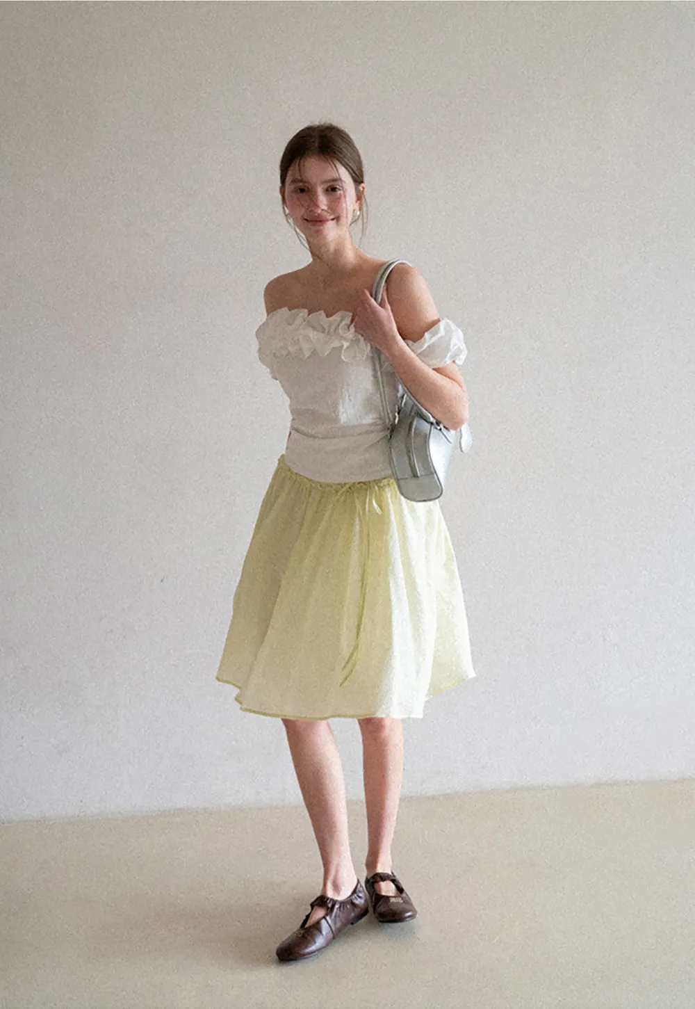 Flowy A-line skirt with gathered waist and layered hem