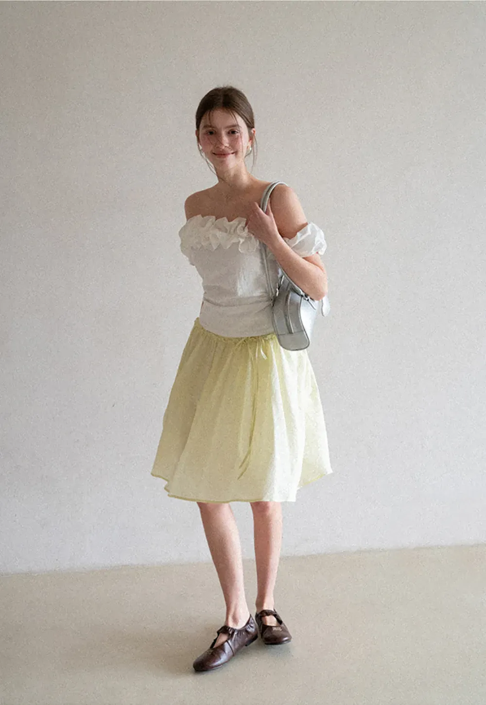 Flowy A-line skirt with gathered waist and layered hem