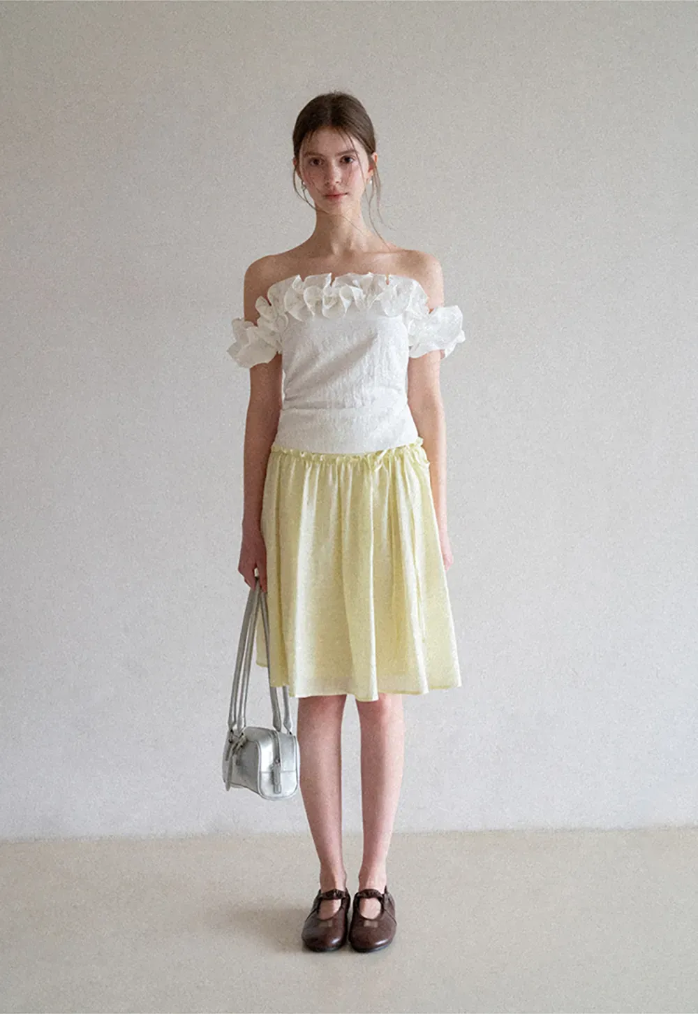 Flowy A-line skirt with gathered waist and layered hem