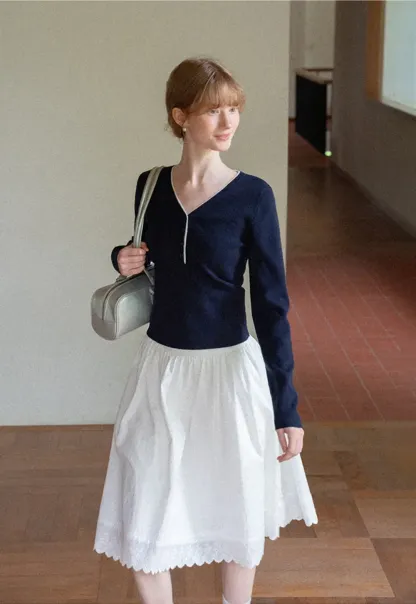 Pleated Skirt with Eyelet Lace Hem
