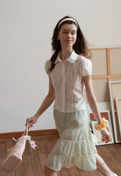 Tiered ruffled skirt with lace trim