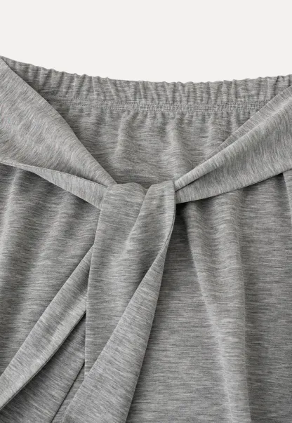 Wrap style long skirt with side drape detail