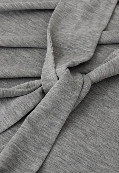 Wrap style long skirt with side drape detail