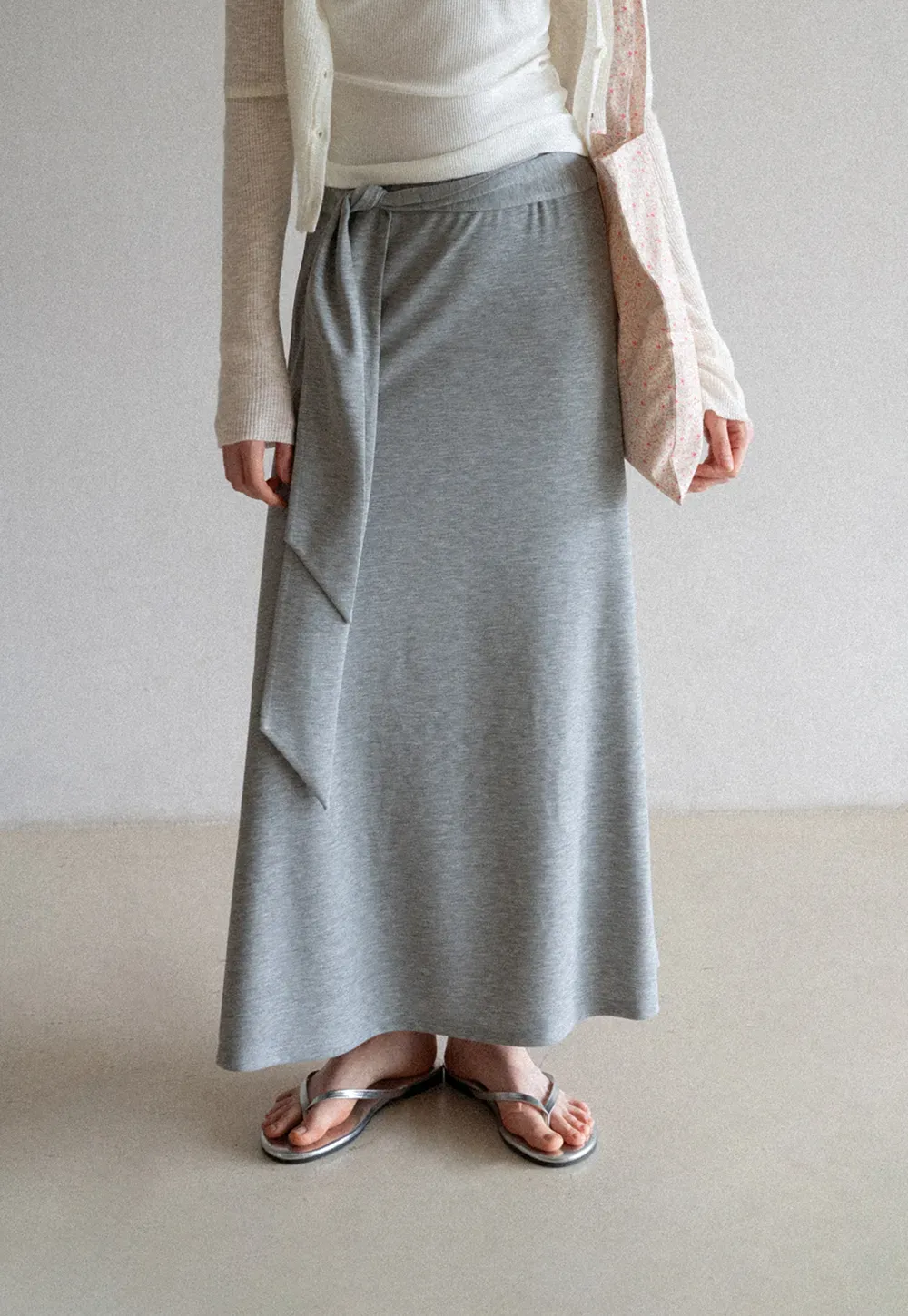 Wrap style long skirt with side drape detail
