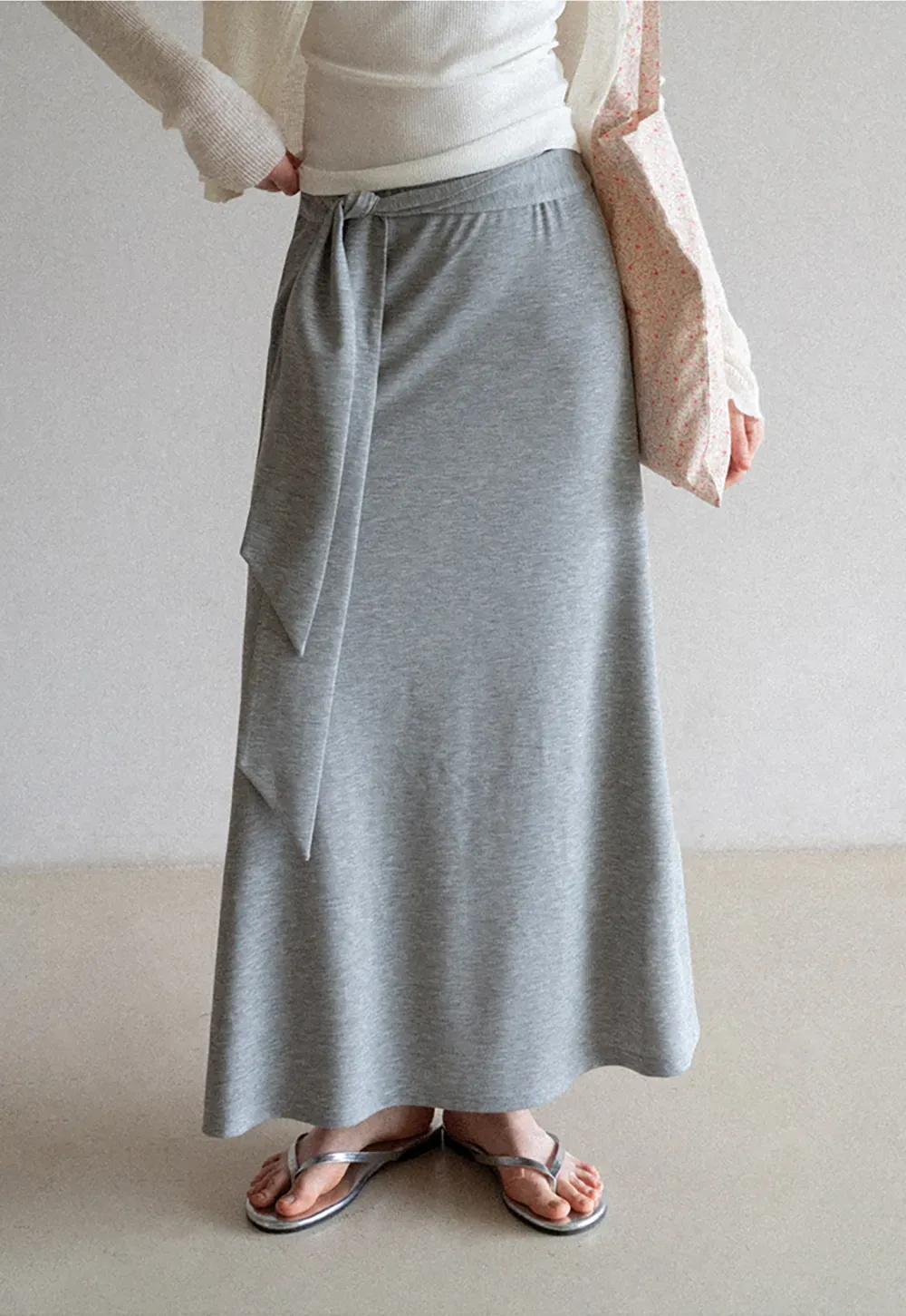 Wrap style long skirt with side drape detail