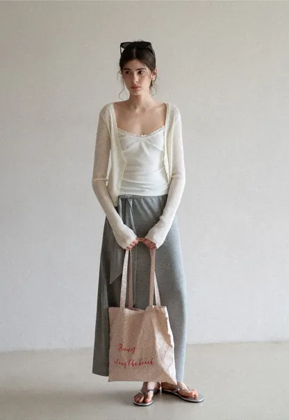 Wrap style long skirt with side drape detail