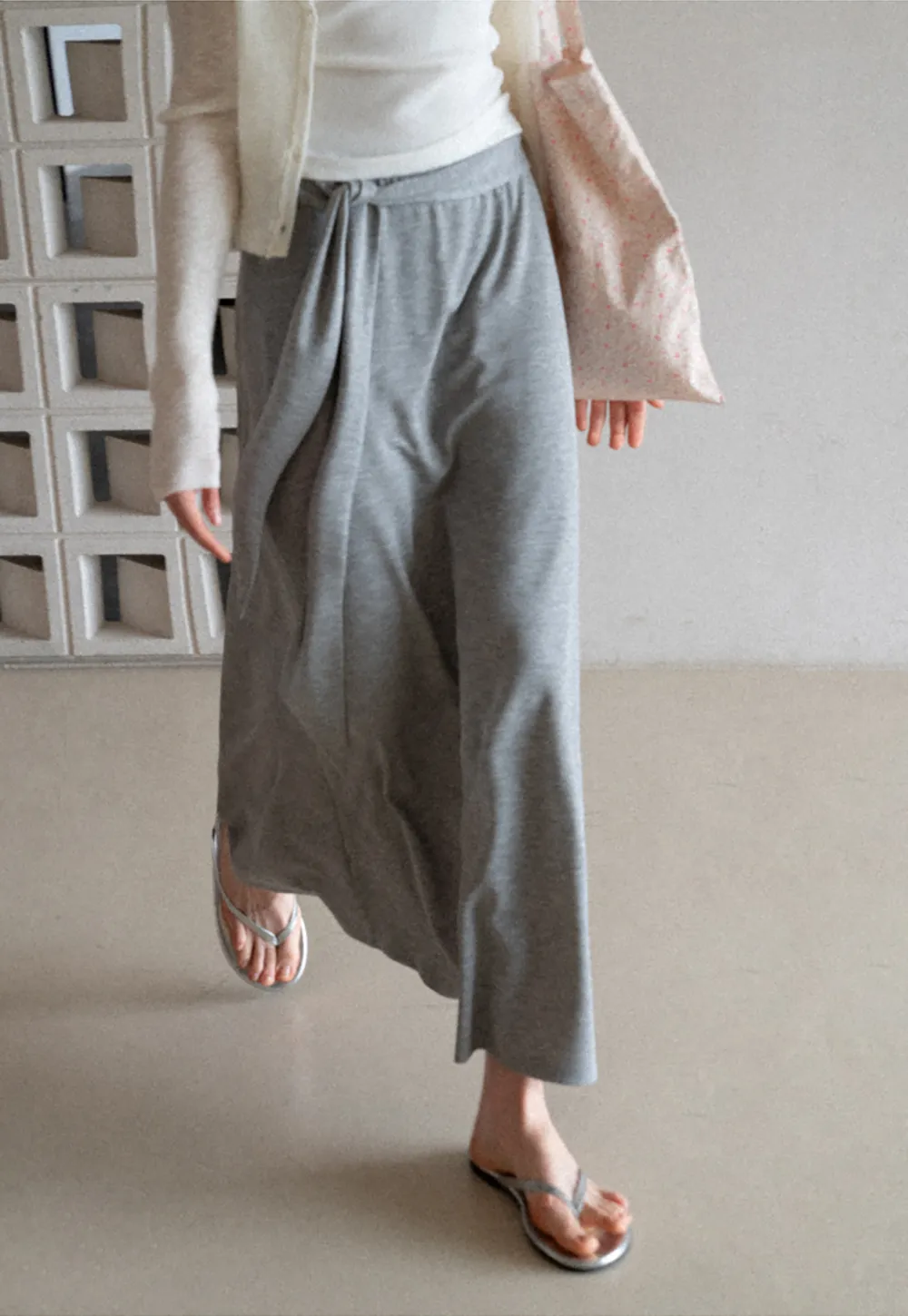 Wrap style long skirt with side drape detail