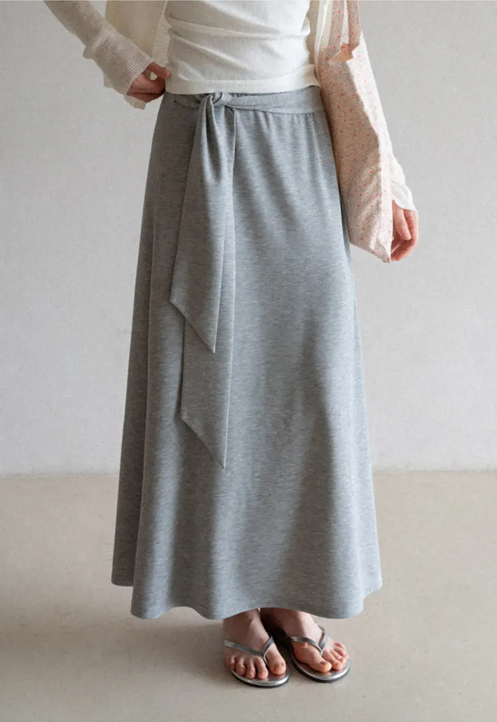 Wrap style long skirt with side drape detail