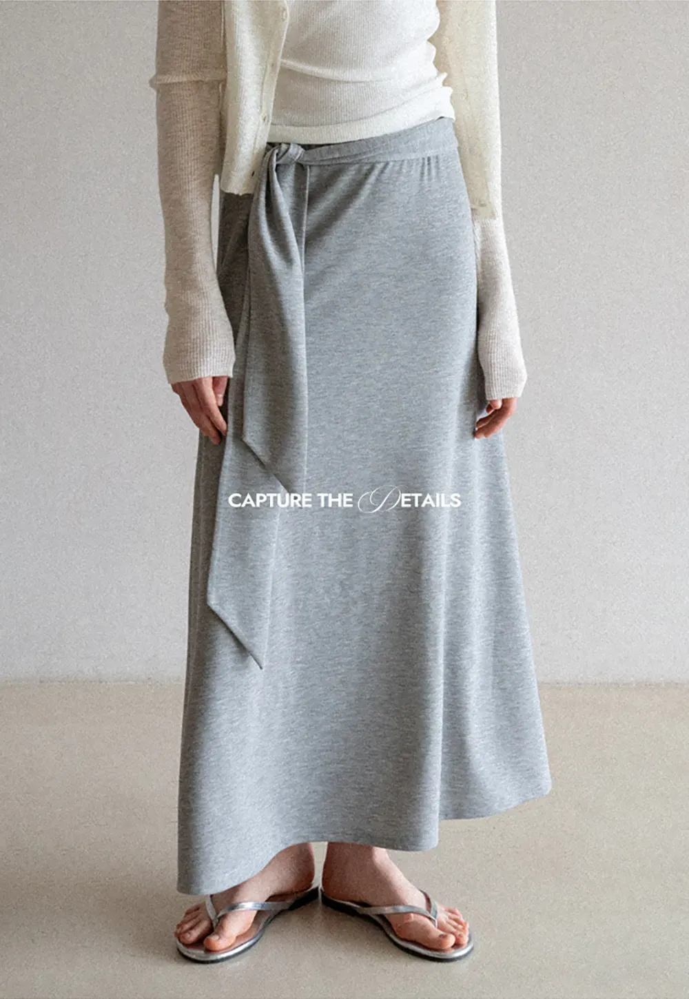 Wrap style long skirt with side drape detail
