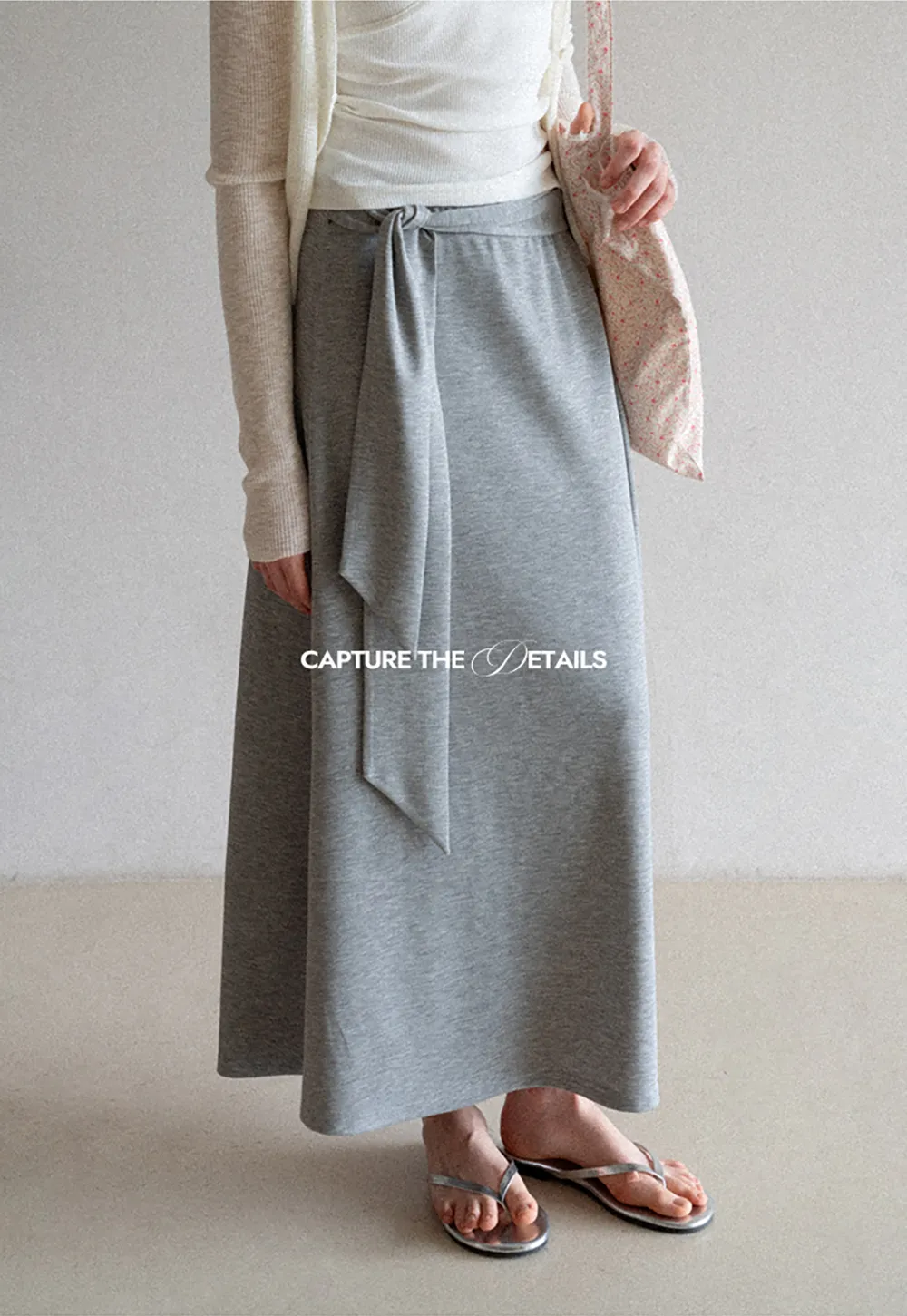 Wrap style long skirt with side drape detail
