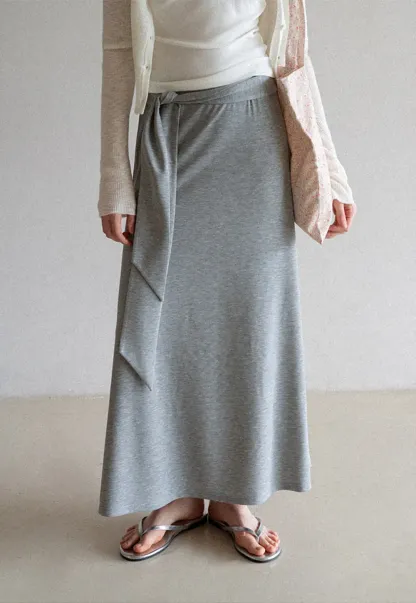 Wrap style long skirt with side drape detail