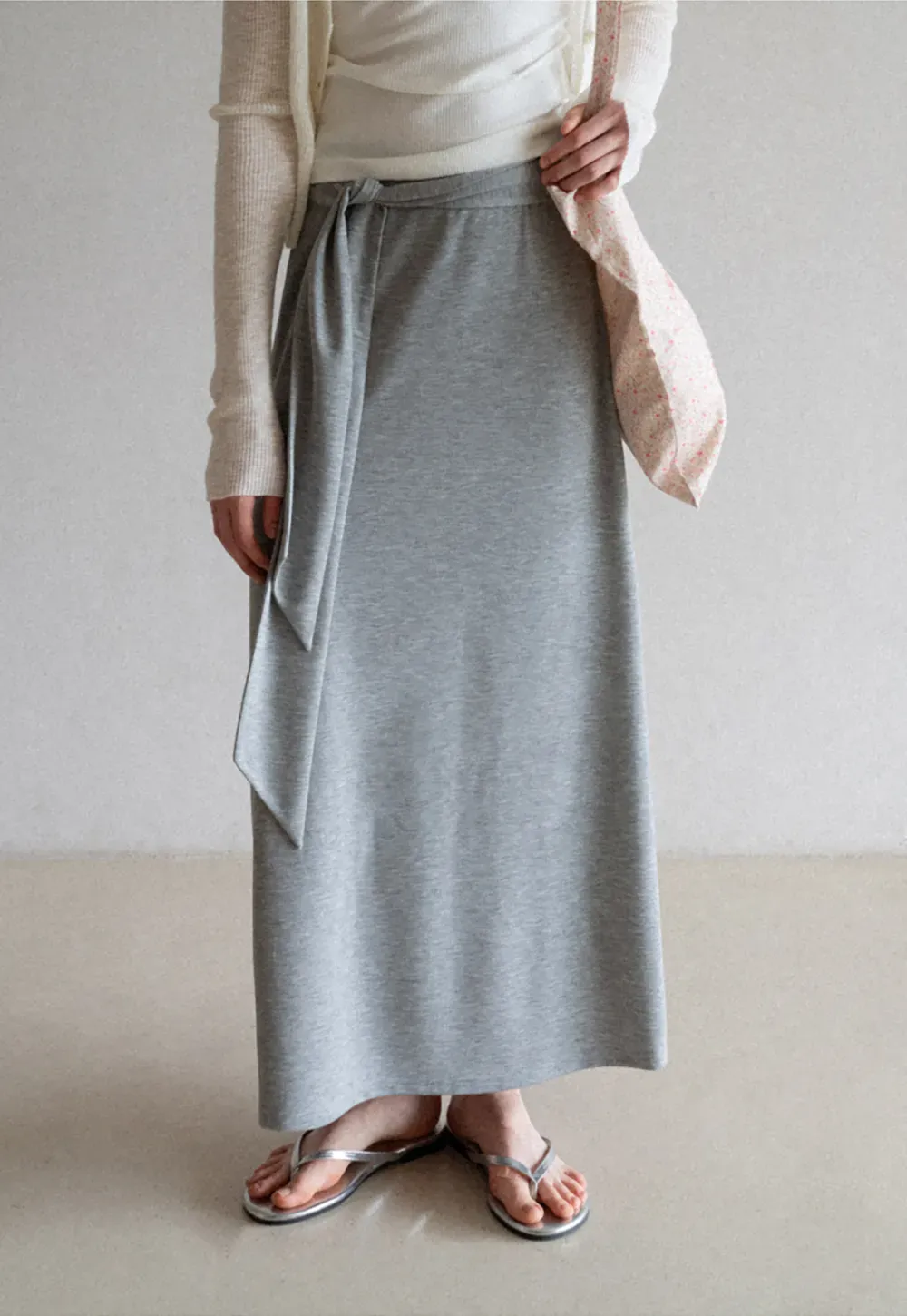 Wrap style long skirt with side drape detail