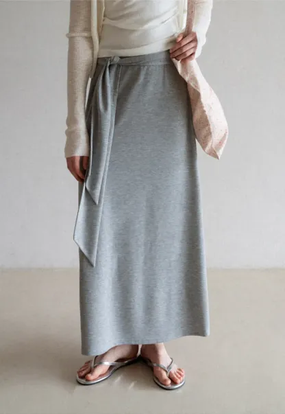 Wrap style long skirt with side drape detail