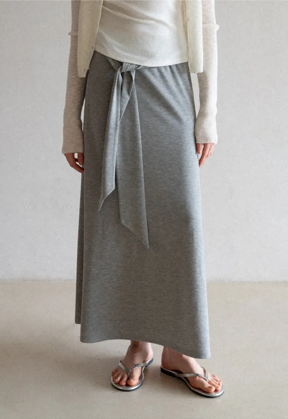Wrap style long skirt with side drape detail