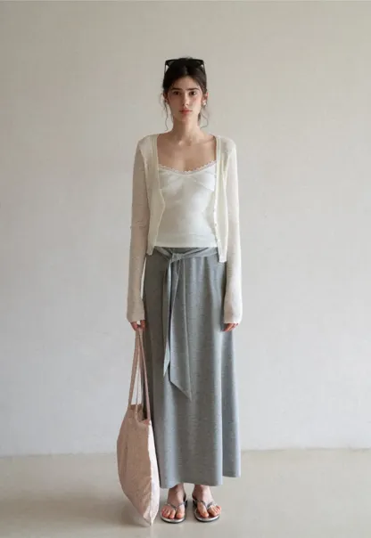 Wrap style long skirt with side drape detail
