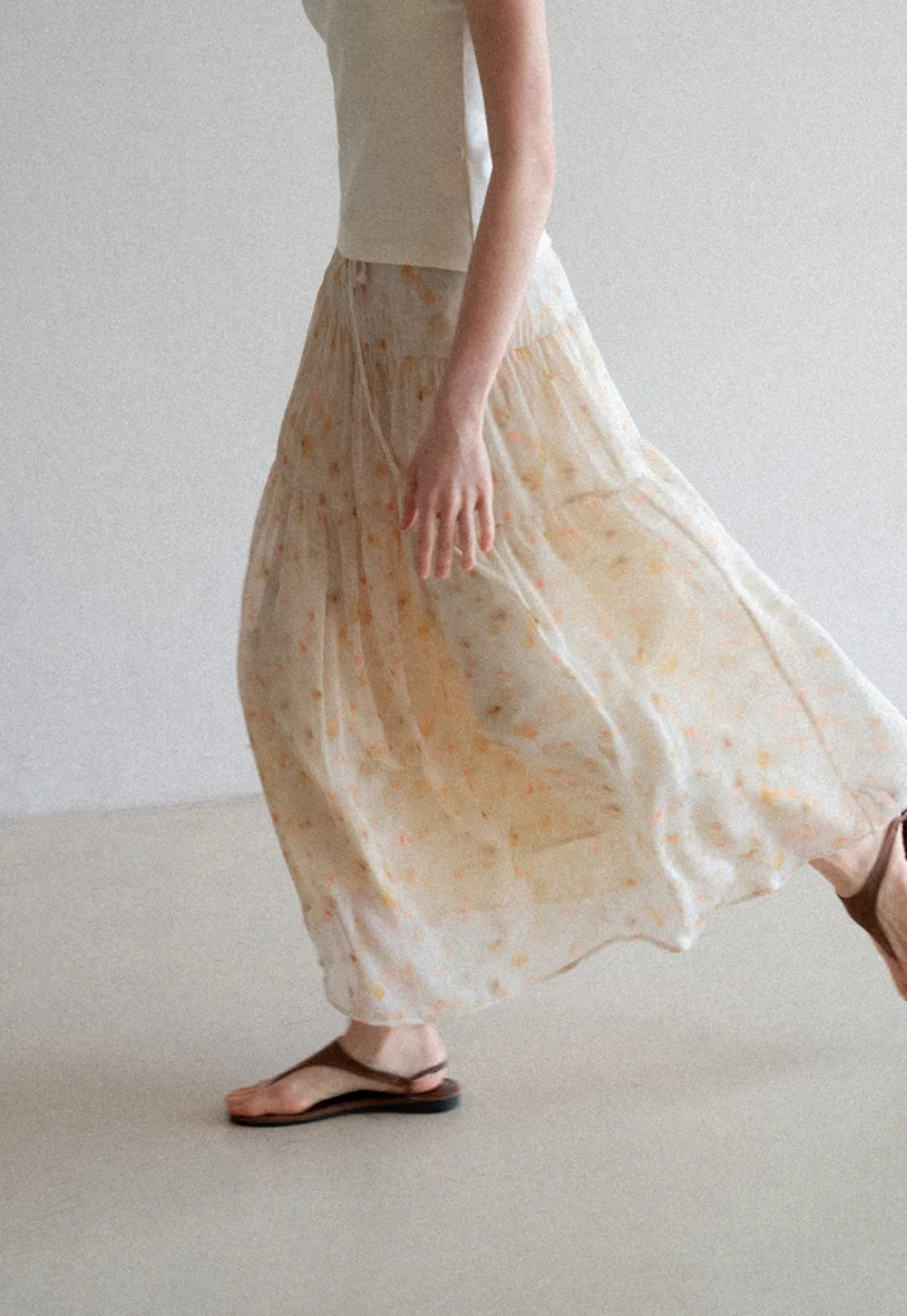 Flowy floral print maxi skirt with tiered layers