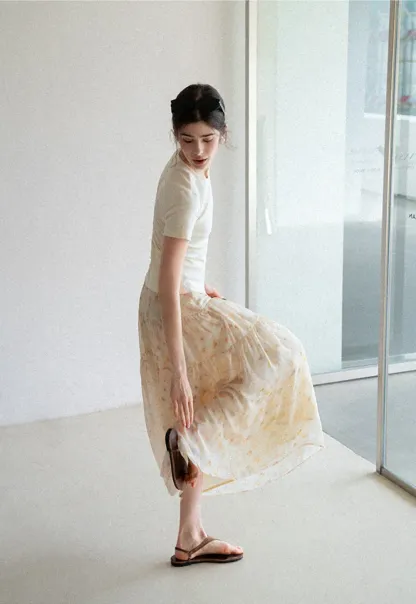 Flowy floral print maxi skirt with tiered layers