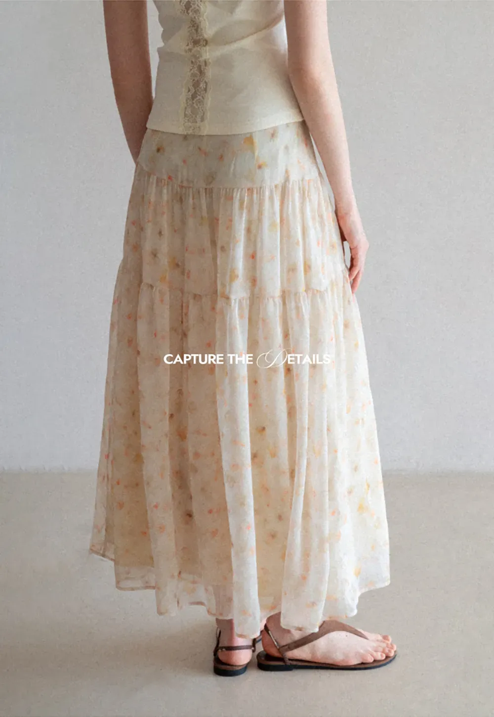 Flowy floral print maxi skirt with tiered layers