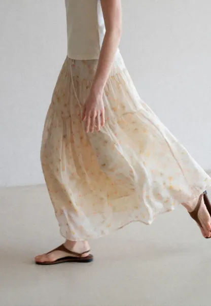 Flowy floral print maxi skirt with tiered layers