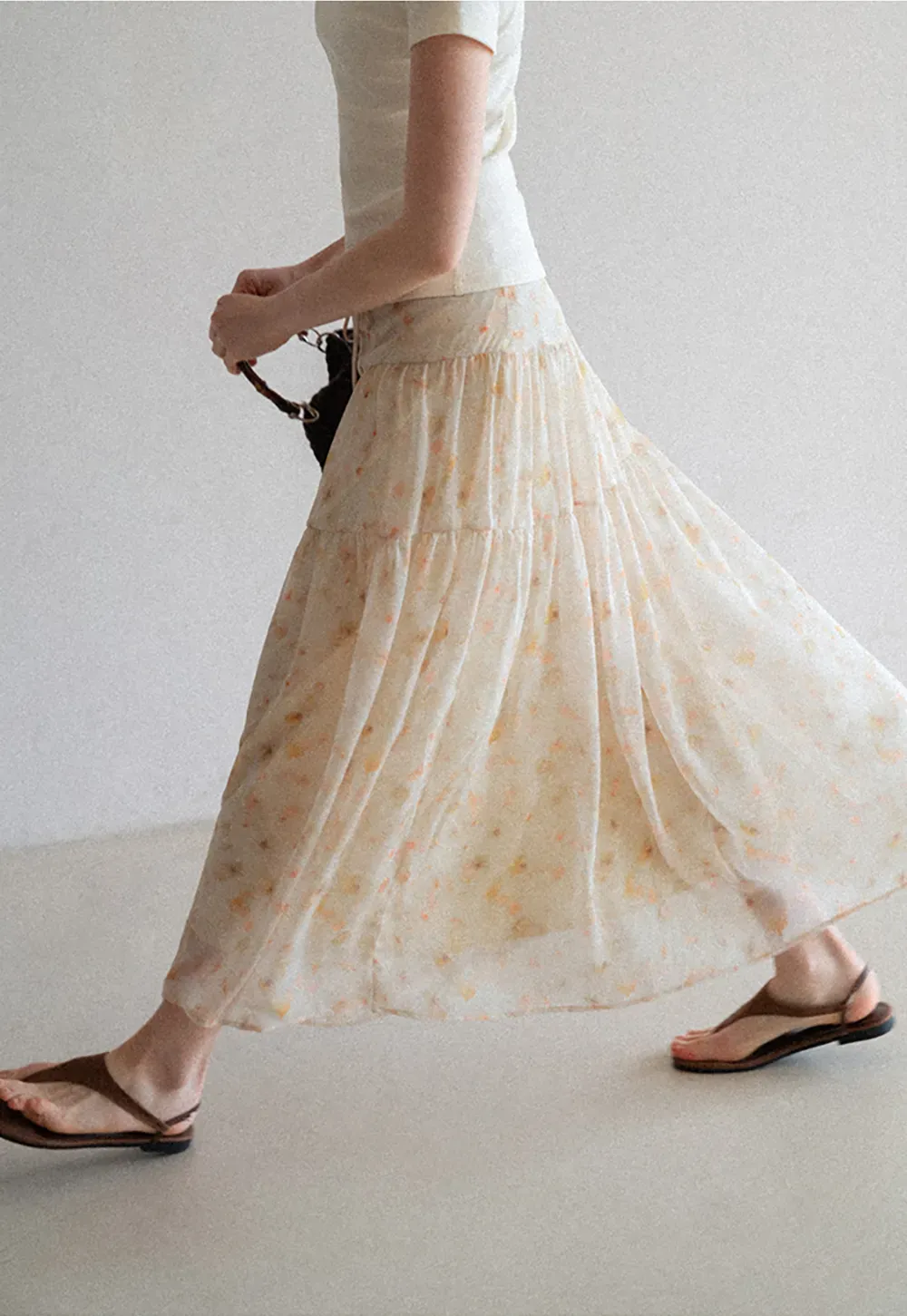 Flowy floral print maxi skirt with tiered layers