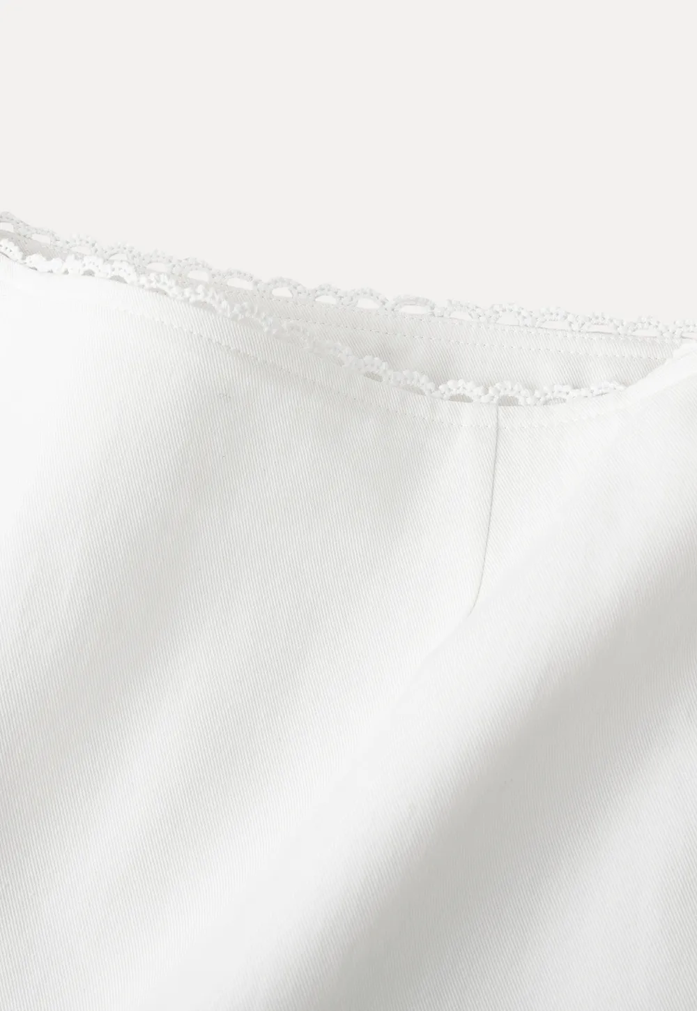 Mini skirt with lace trim at waist and hem