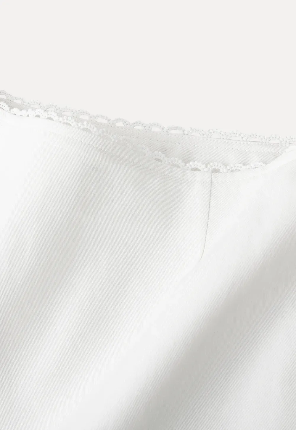 Mini skirt with lace trim at waist and hem