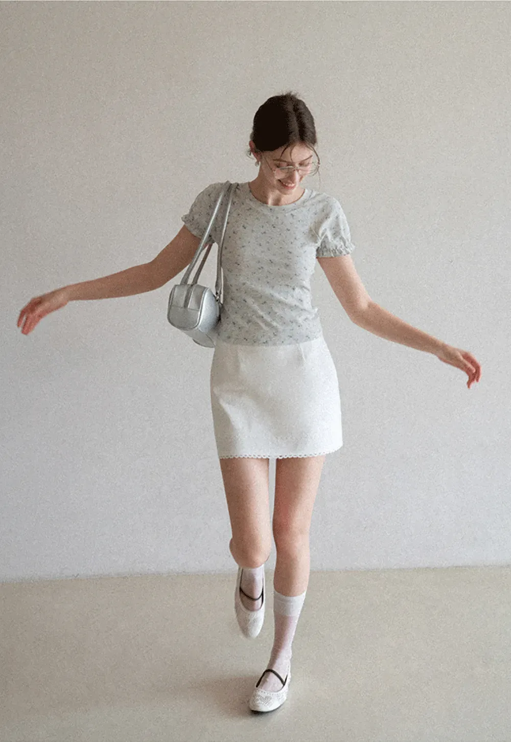 Mini skirt with lace trim at waist and hem