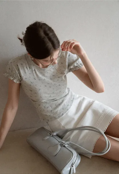 Mini skirt with lace trim at waist and hem