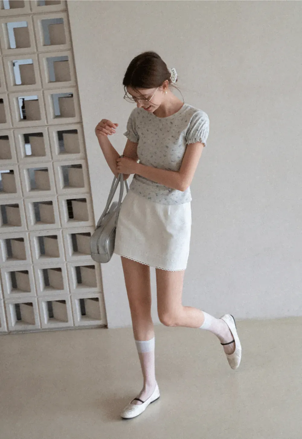 Mini skirt with lace trim at waist and hem